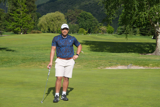Polynesian-inspired Island Nights Polo worn by a golfer on the course