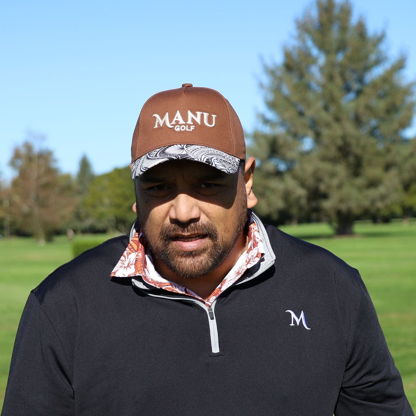 The Manu Golf Heritage Brown Golf Hat. Golf hat designed by Polynesian Culture and patterns on the brim.