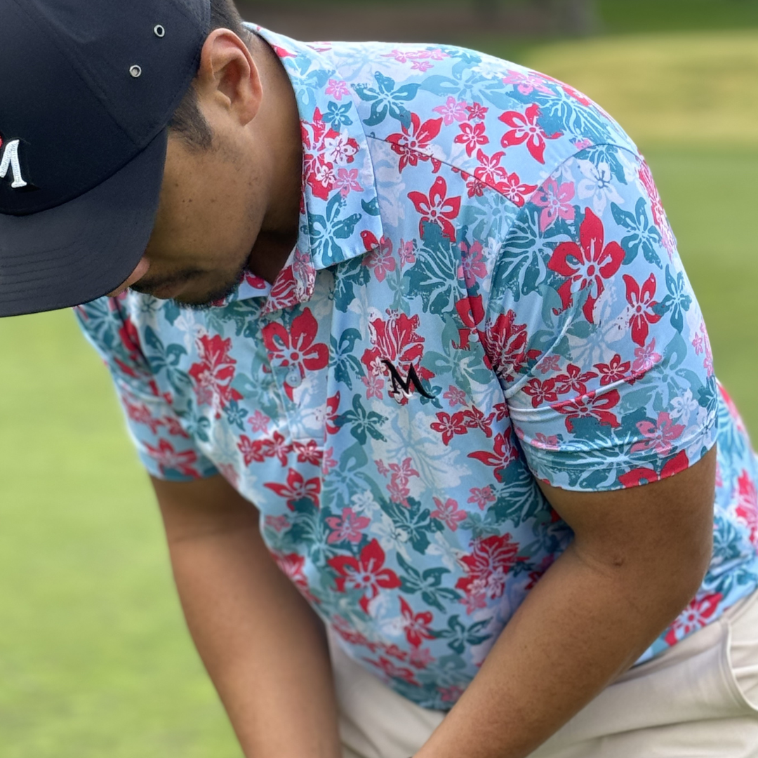 Close-up of the Island Bloom Polo shirt fabric, showcasing the intricate Polynesian-inspired design. Proudly designed in New Zealand.